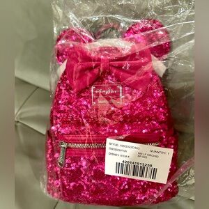 Disney Loungefly magenta sequin backpack, NWT, still in packaging.